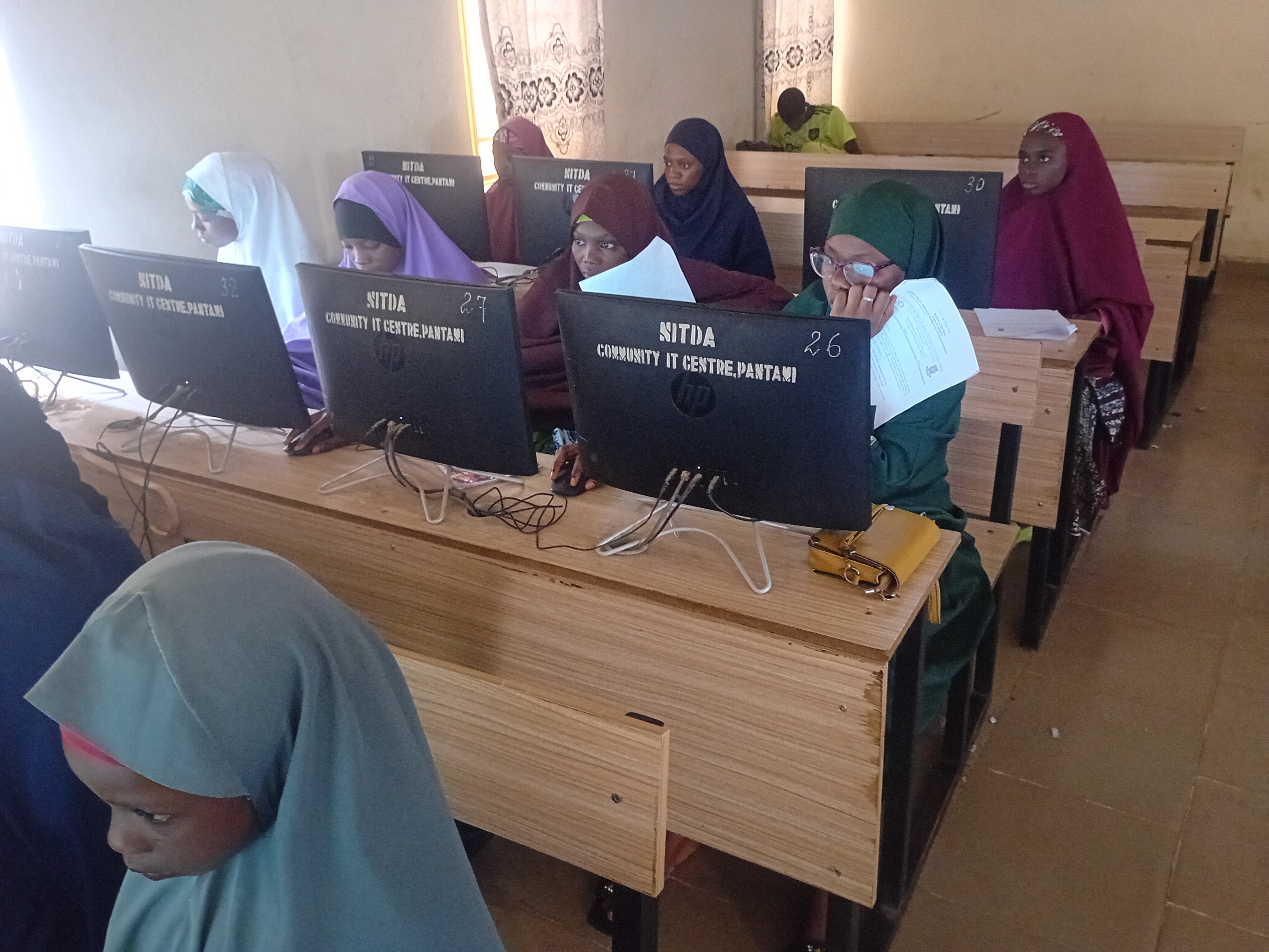 GeekInk students learning tech skills in modern lab